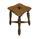 Tabouret en bois massif et sculpté