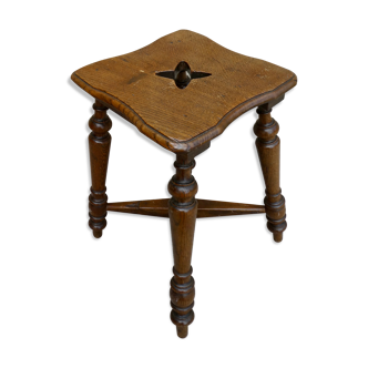 Solid wood and carved stool