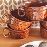 Caramel brown ceramic mugs with geometric flower pattern from the 70s