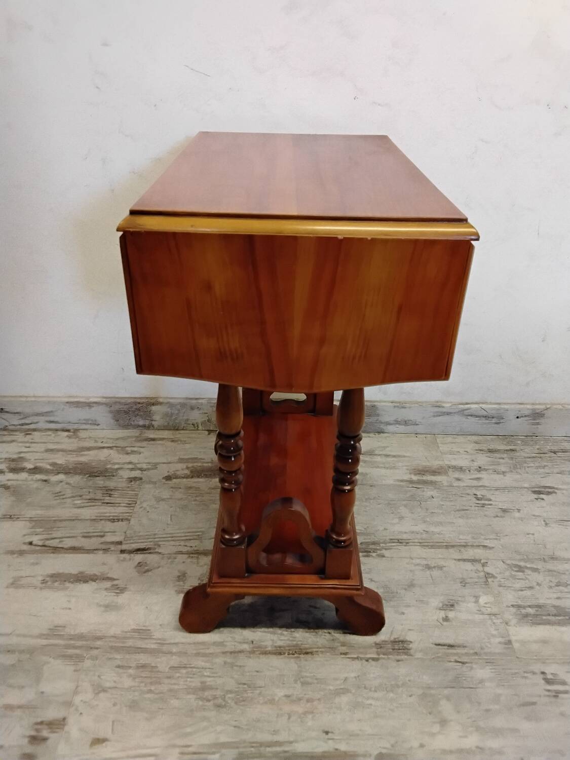 Small wooden drop-leaf table