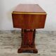 Small wooden drop-leaf table