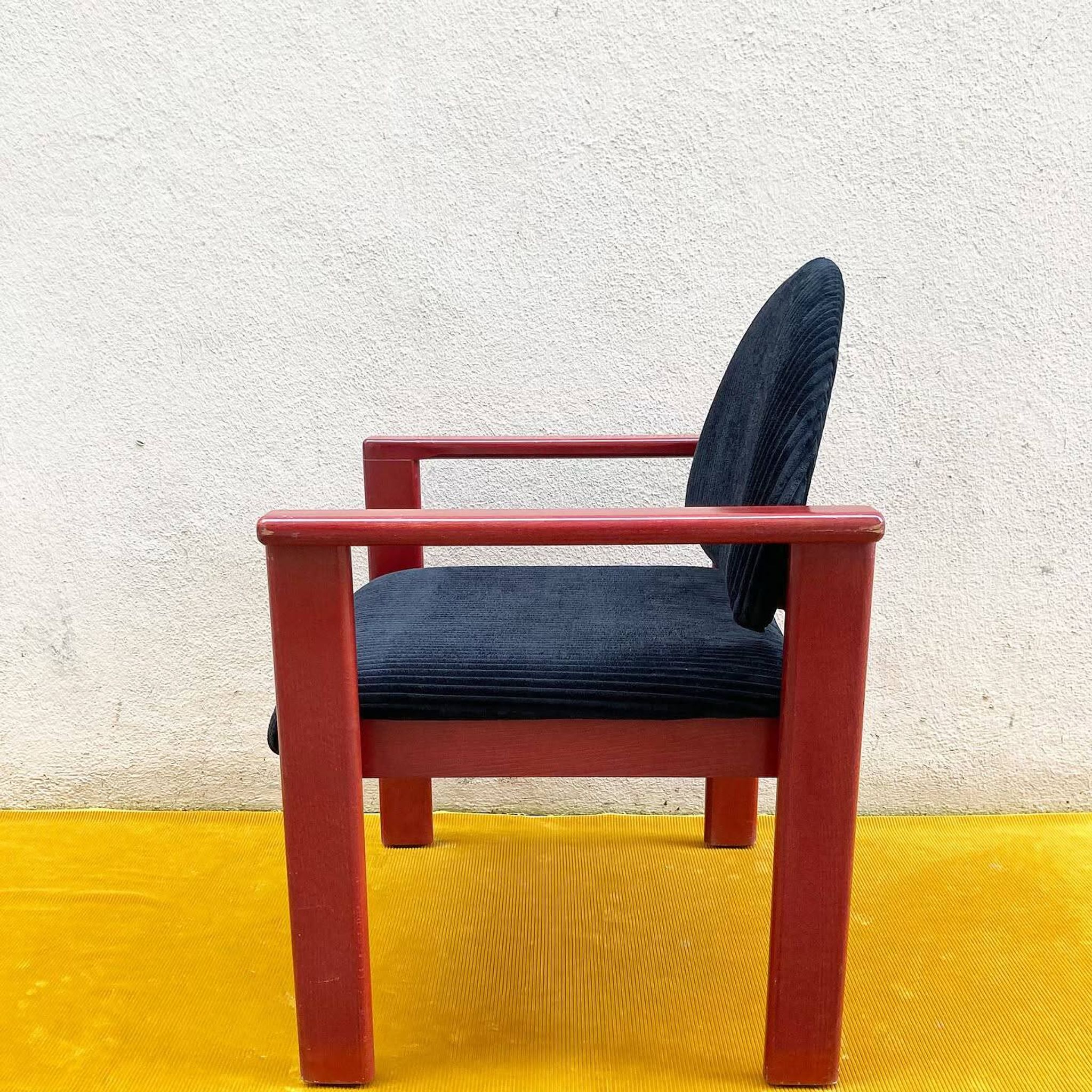 MMO Mobilier Collectif armchair, red patinated wood and black corduroy