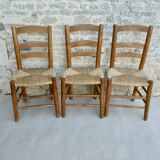 Trio of wooden chairs and mulched seat