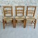 Trio of wooden chairs and mulched seat