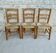 Trio de chaises en bois et assise paillée