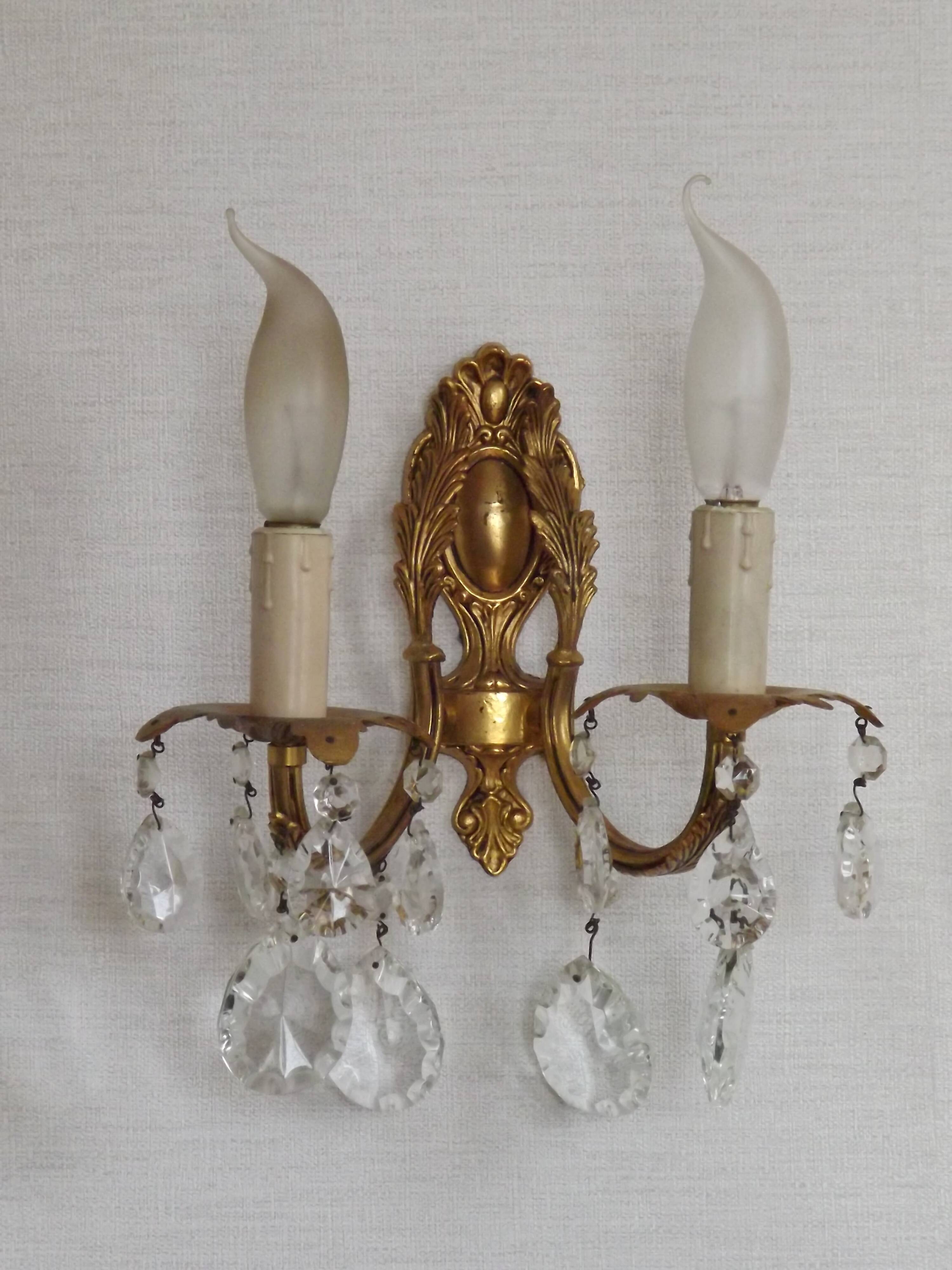 Pair of antique 2-light wall sconces in bronze with crystal pendants, Spain.