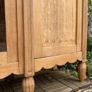 Asymmetrical Art Deco glass-fronted Parisian wardrobe in raw oak, 1930.
