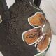 Two-handled vase with enamelled floral decor