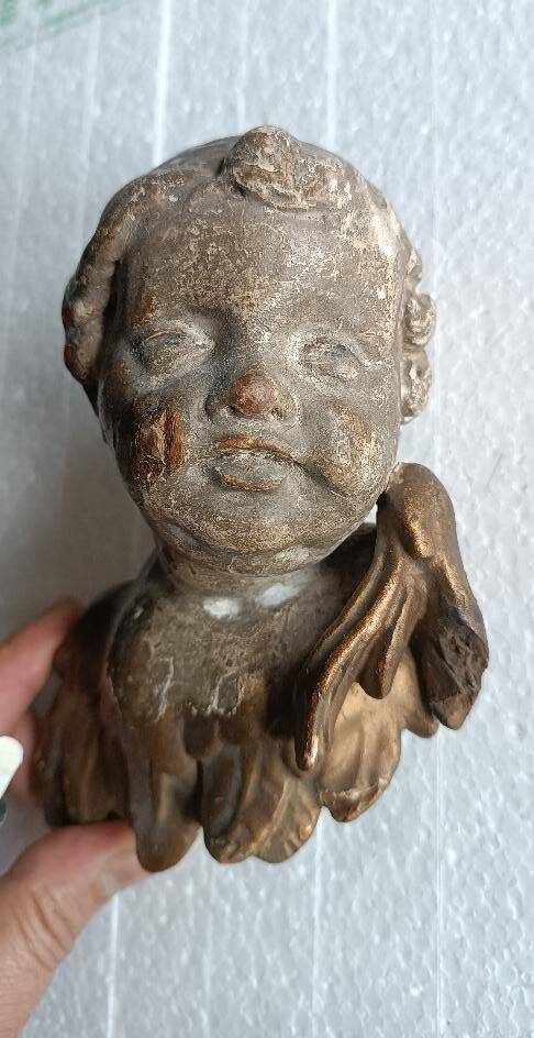 Gilded and silvered wooden angel's head, 18th century
