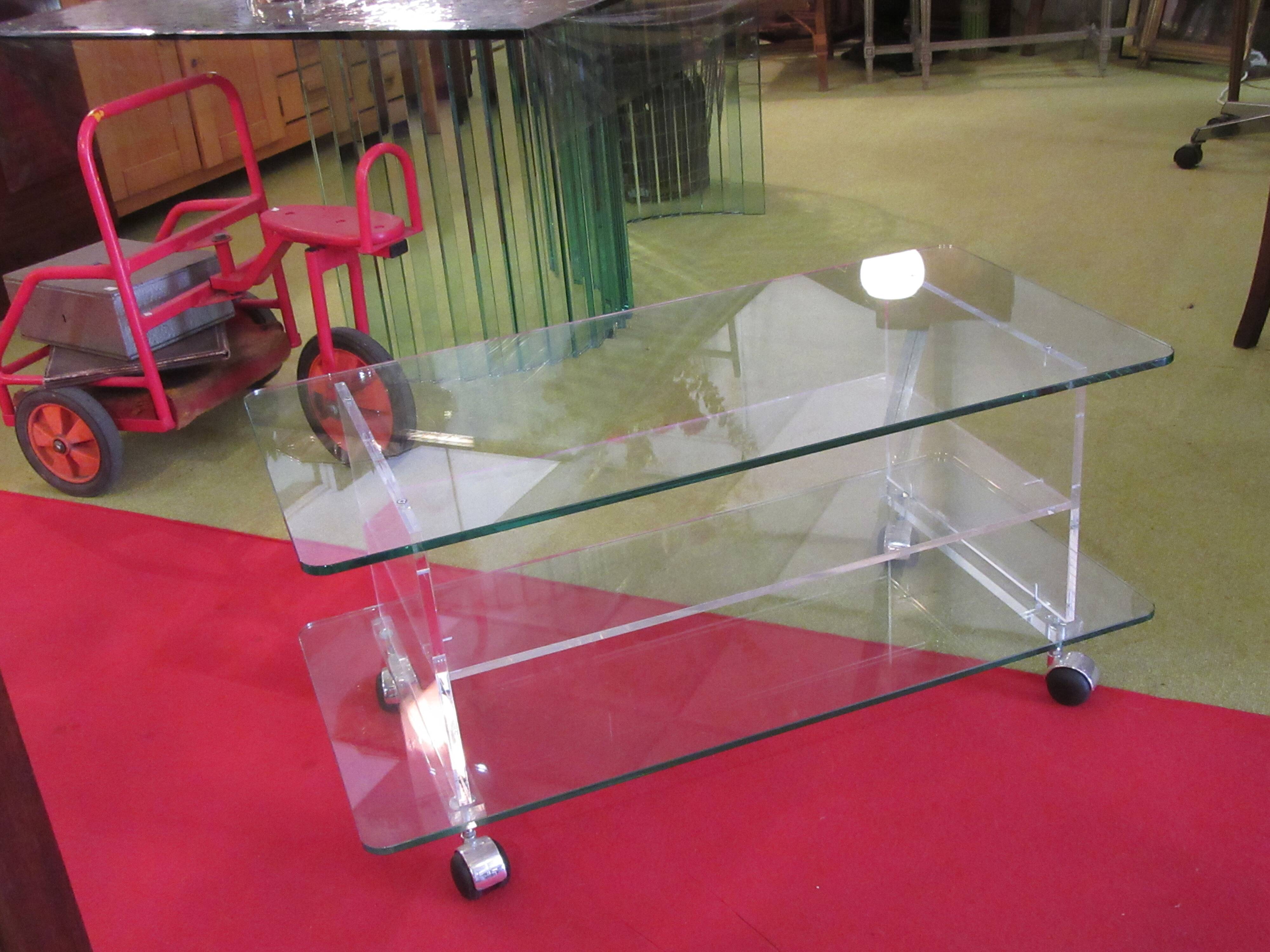 vintage glass coffee table with plexiglass legs