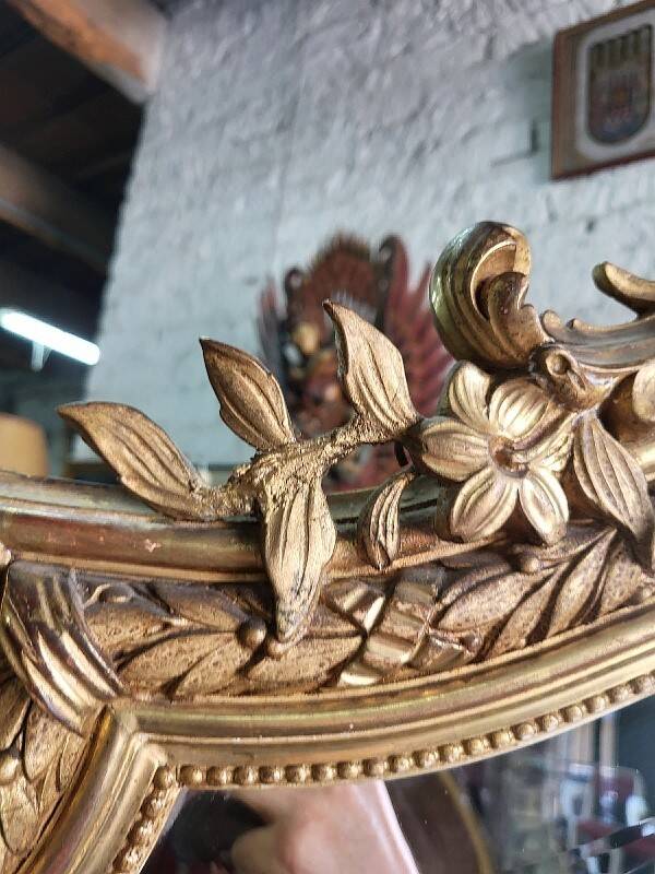 Large Louis XV gilded shell mirror from the 19th century