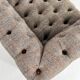 Chesterfield sofa in leather, fabric and wood