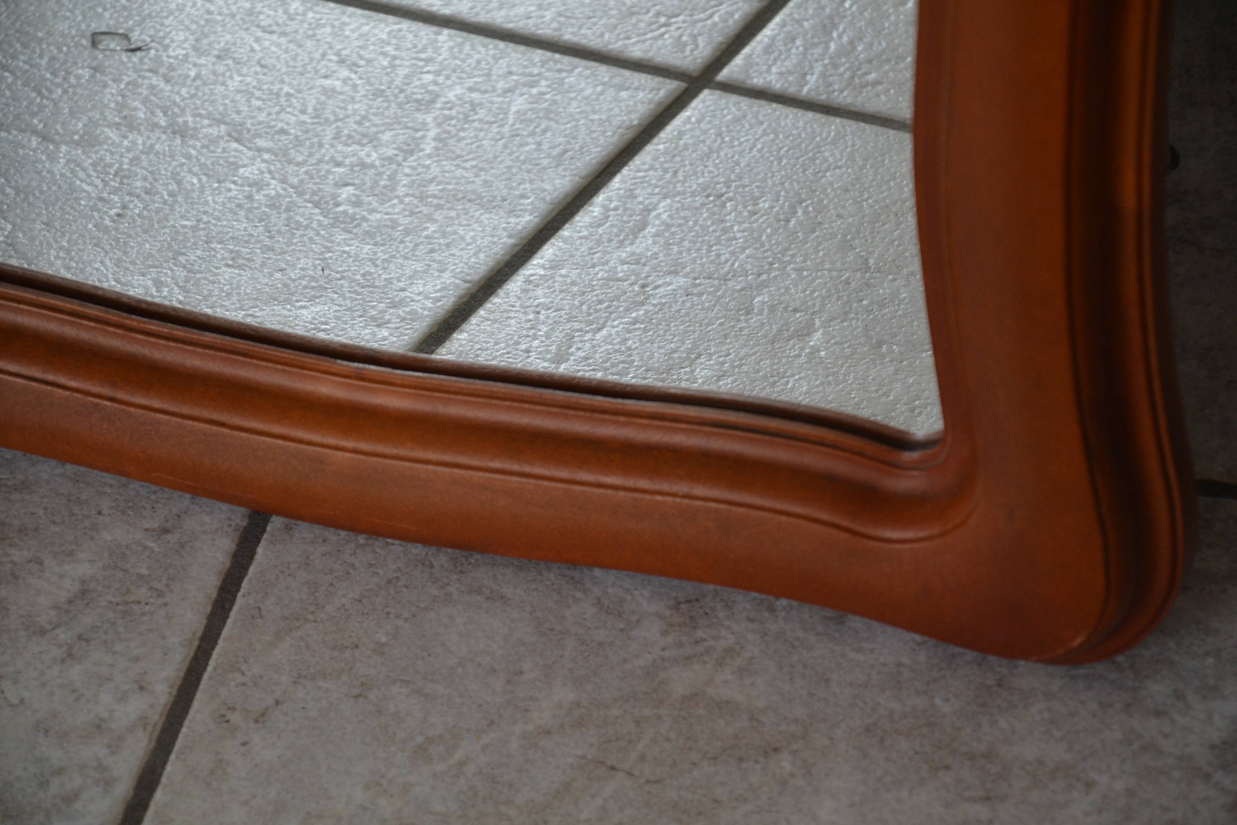 Vintage organic wavy cast resin mirror