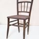Chair with a slatted backrest and caned seat.