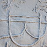 old linen sheet with monogram