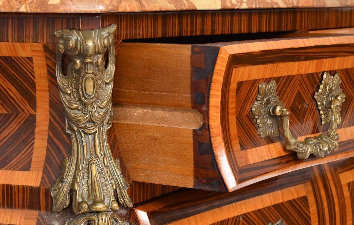 Tomb-shaped commode in Louis XV style with decoration featuring Spanish figures.