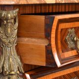Tomb-shaped commode in Louis XV style with decoration featuring Spanish figures.
