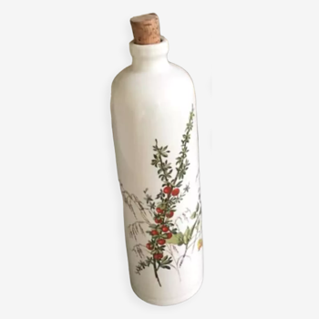 White glazed stoneware bottle with floral decoration. Cork