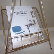 Vintage magazine holder in gold metal