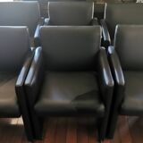 6 faux leather chairs on wheels
