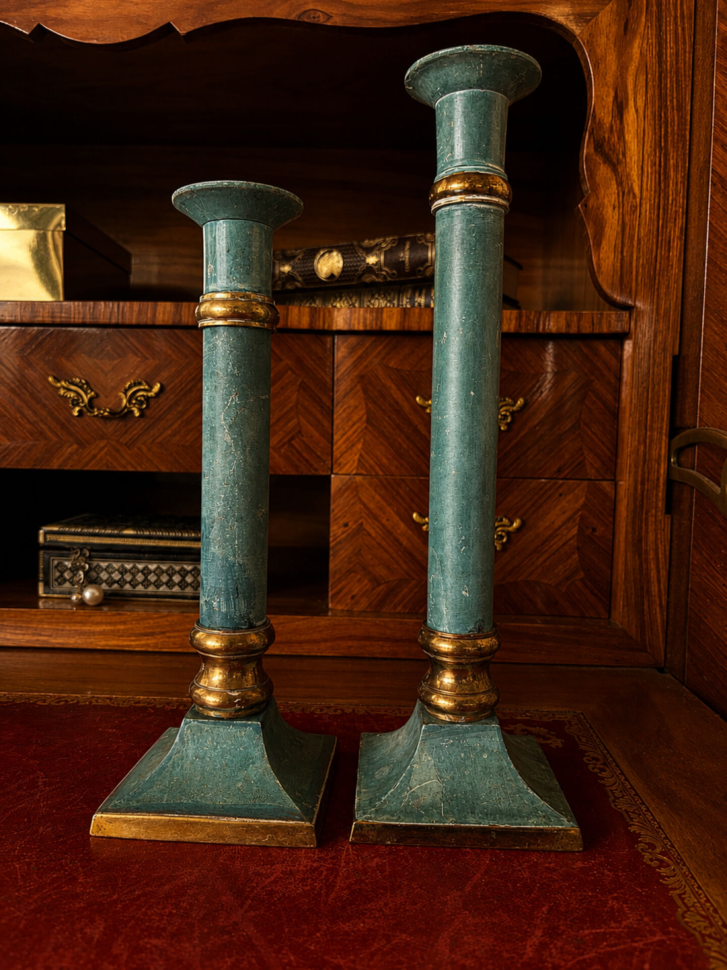 Exceptional pair of large candlesticks in patinated greenish-blue brass.
