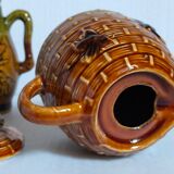 Set of old teapots and honey pot