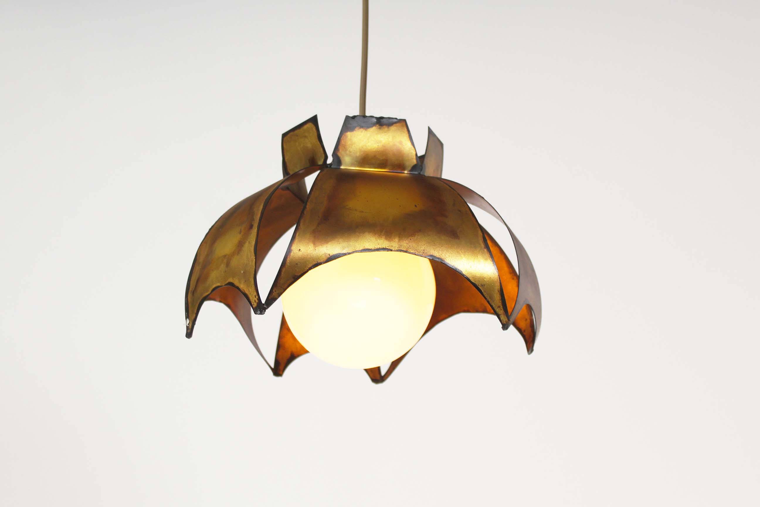 Original Italian torch cut brutalist brass chandelier