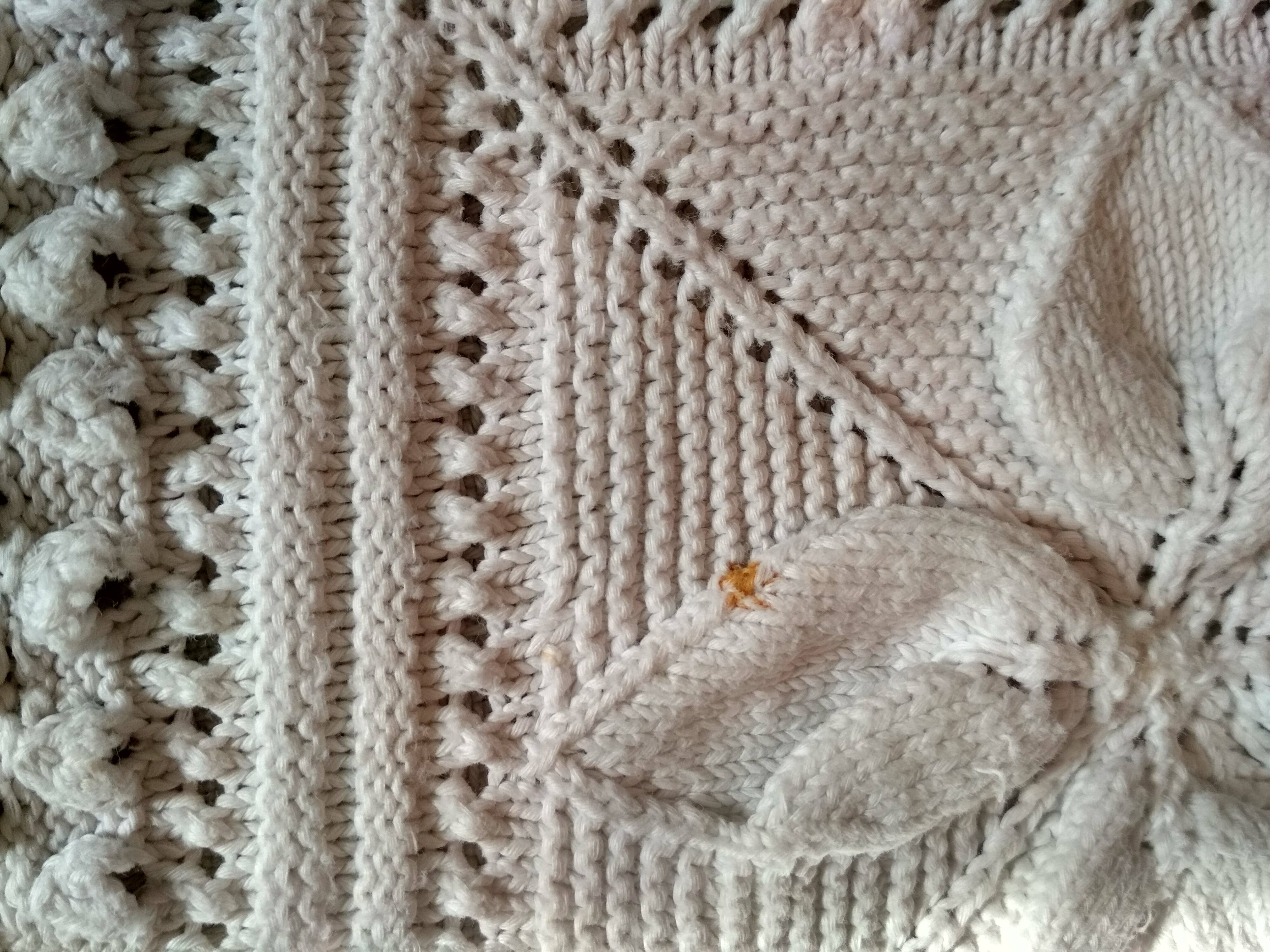 Knitted white cotton bedspread