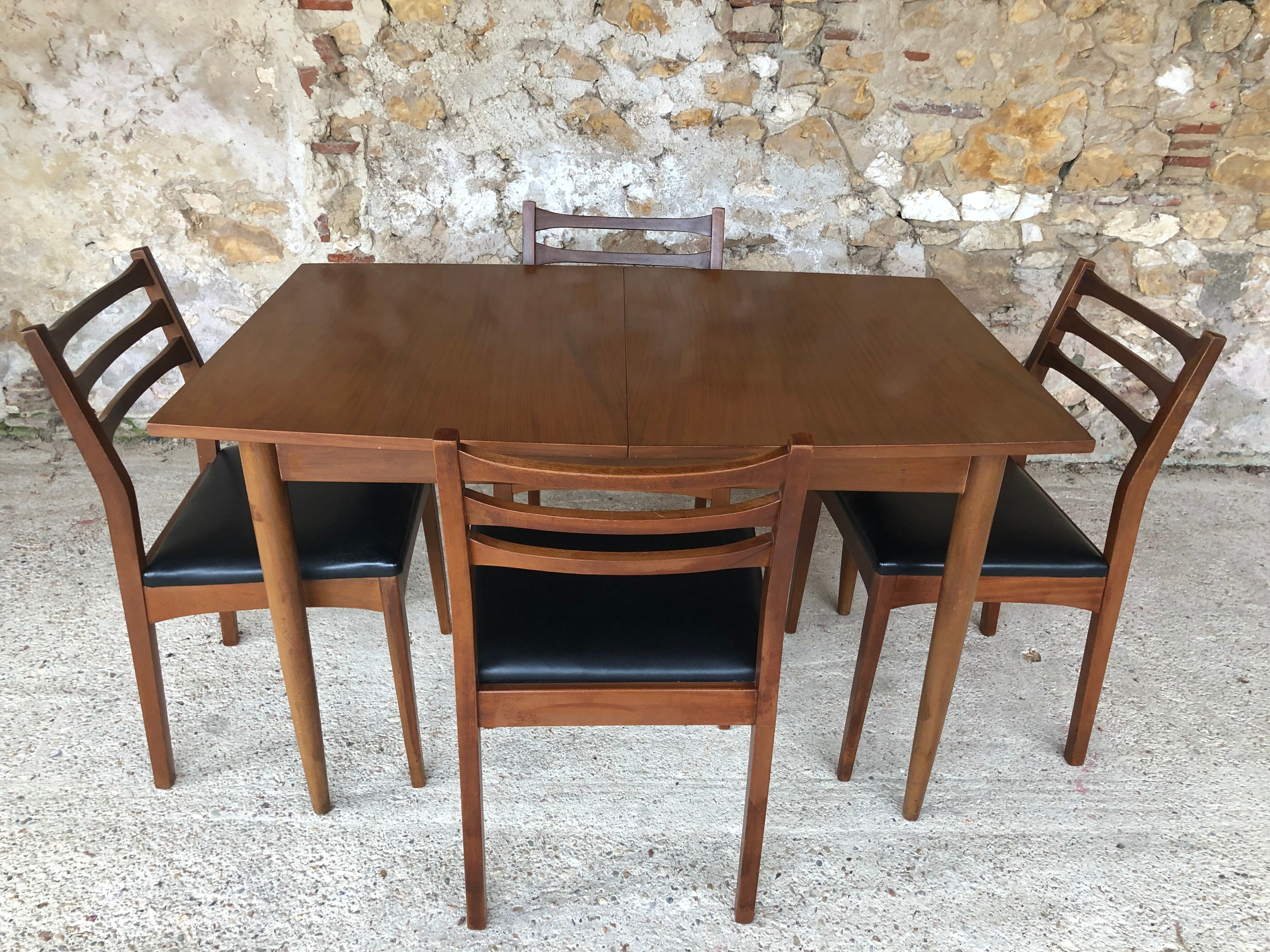 Scandinavian extension teak stretch table in butterfly ephardt by Meredew circa 60's