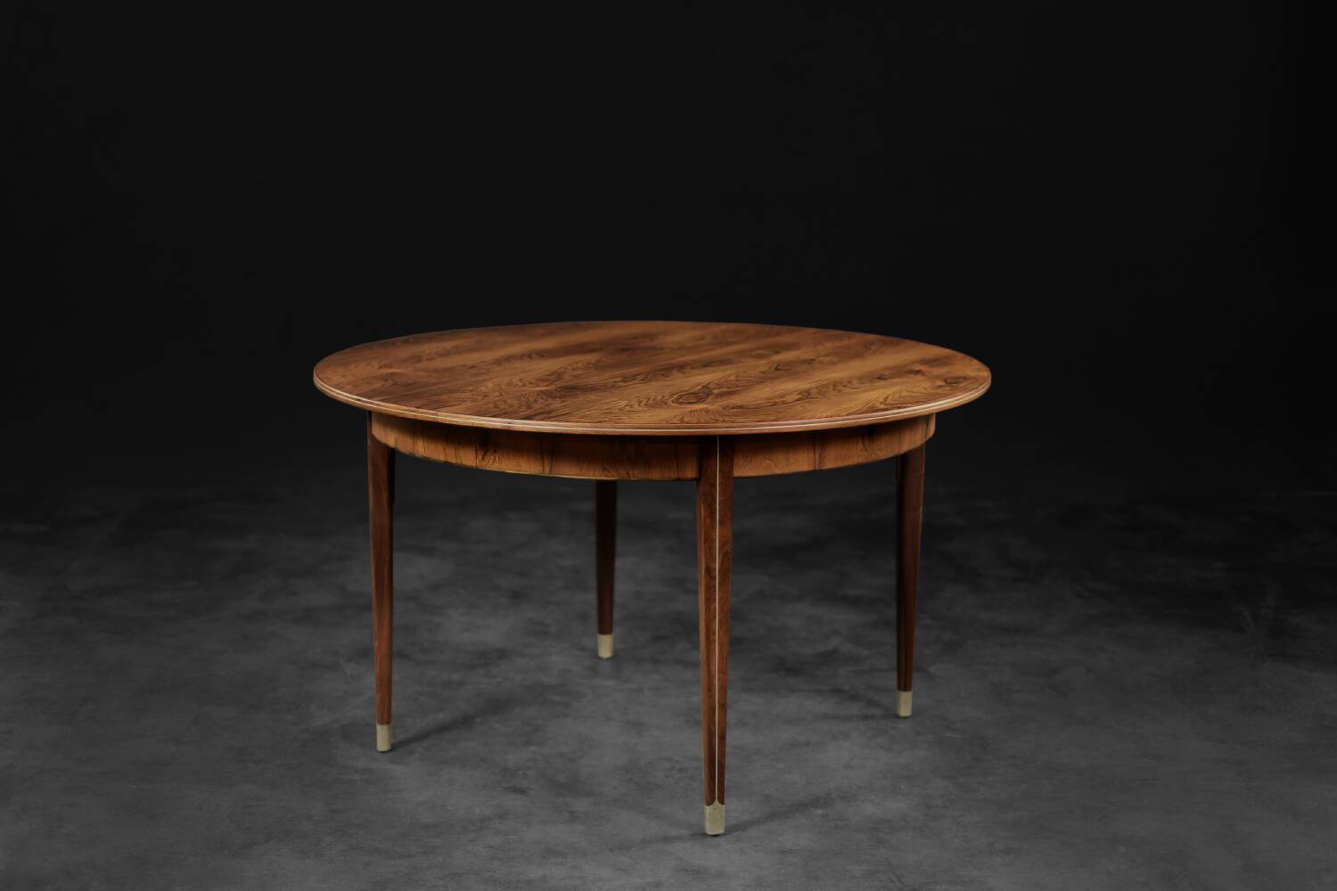 Vintage round folding dining table in rosewood by Agner Christoffersen, Denmark.