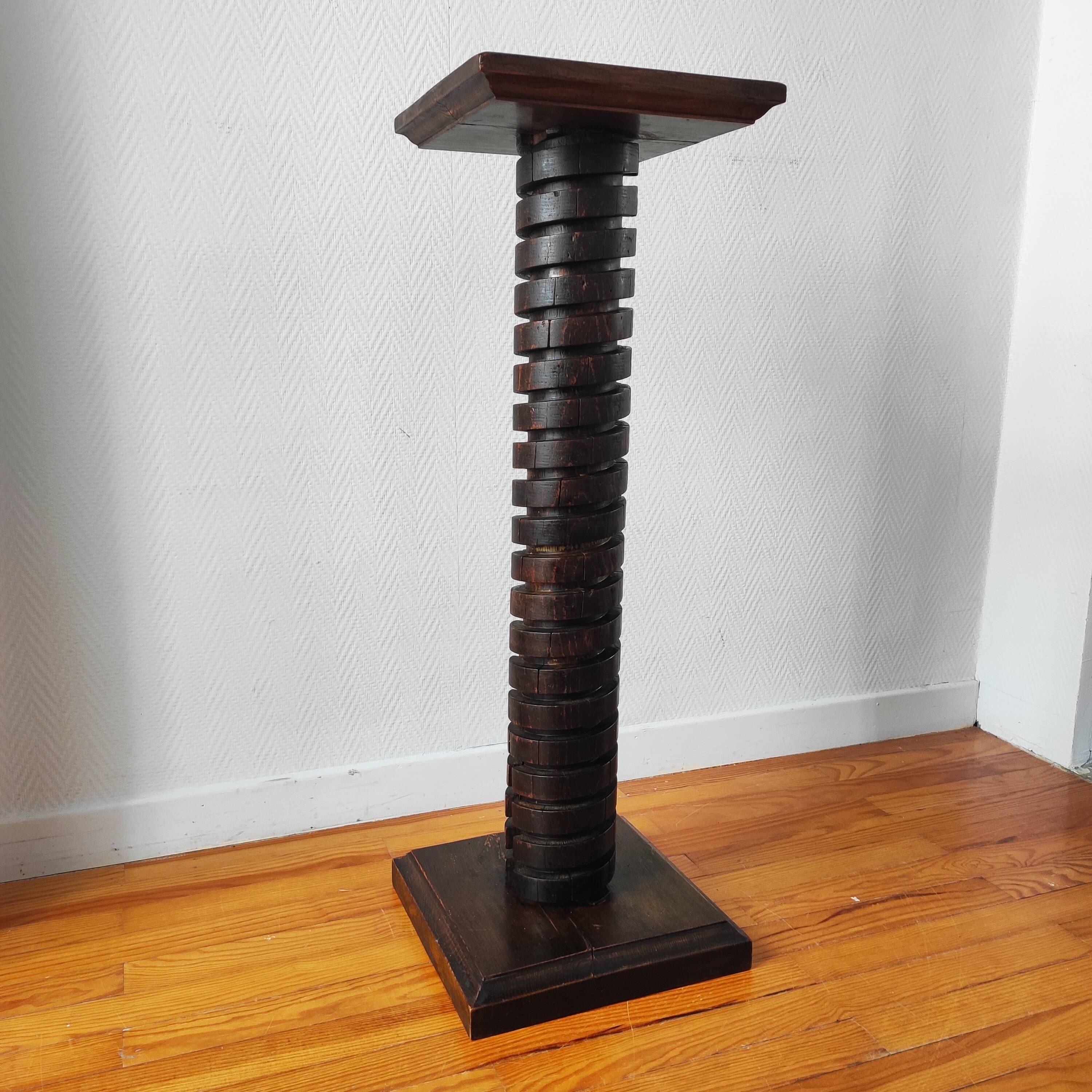 Brutalist column – old Burgundy press screw