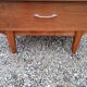 Chest of drawers of the 50s in rosewood spindle feet and fins