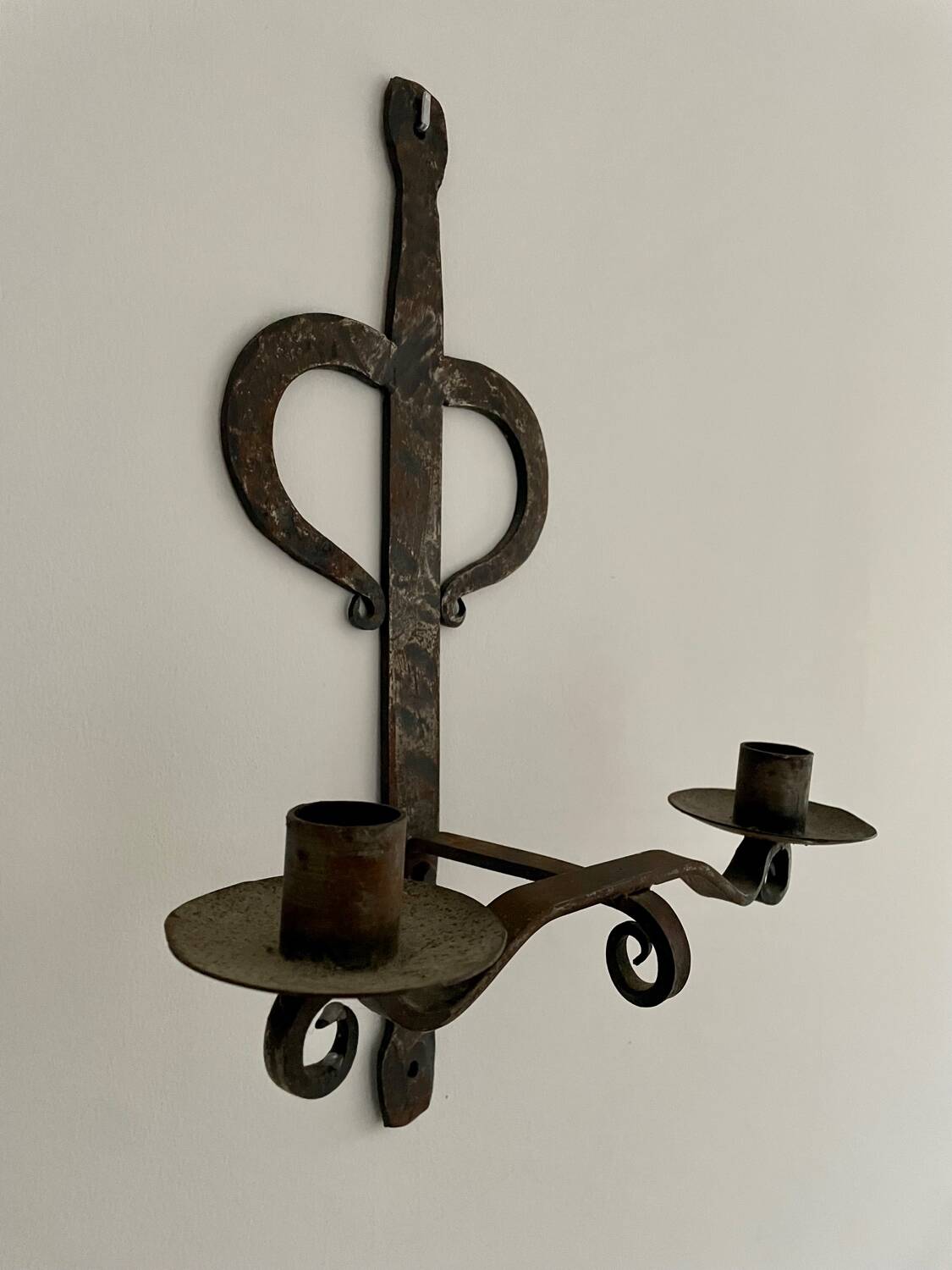 Brutalist wrought iron wall candle holder