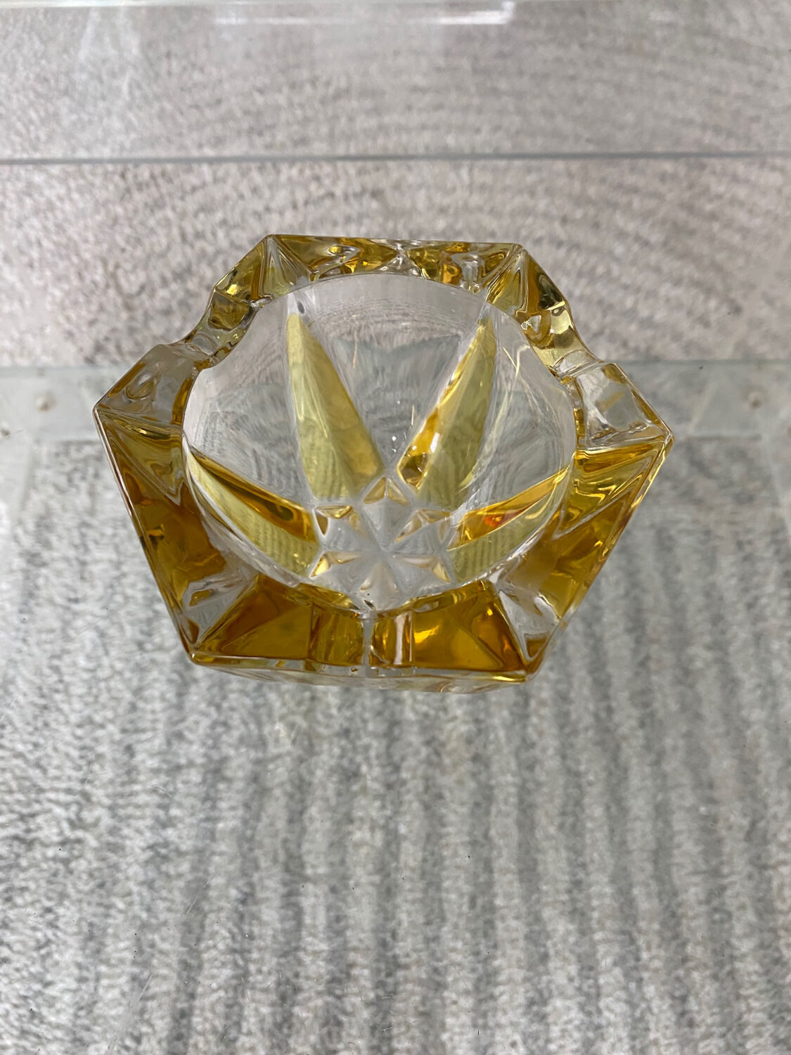 Vintage empty pocket ashtray in yellow chiseled glass or crystal