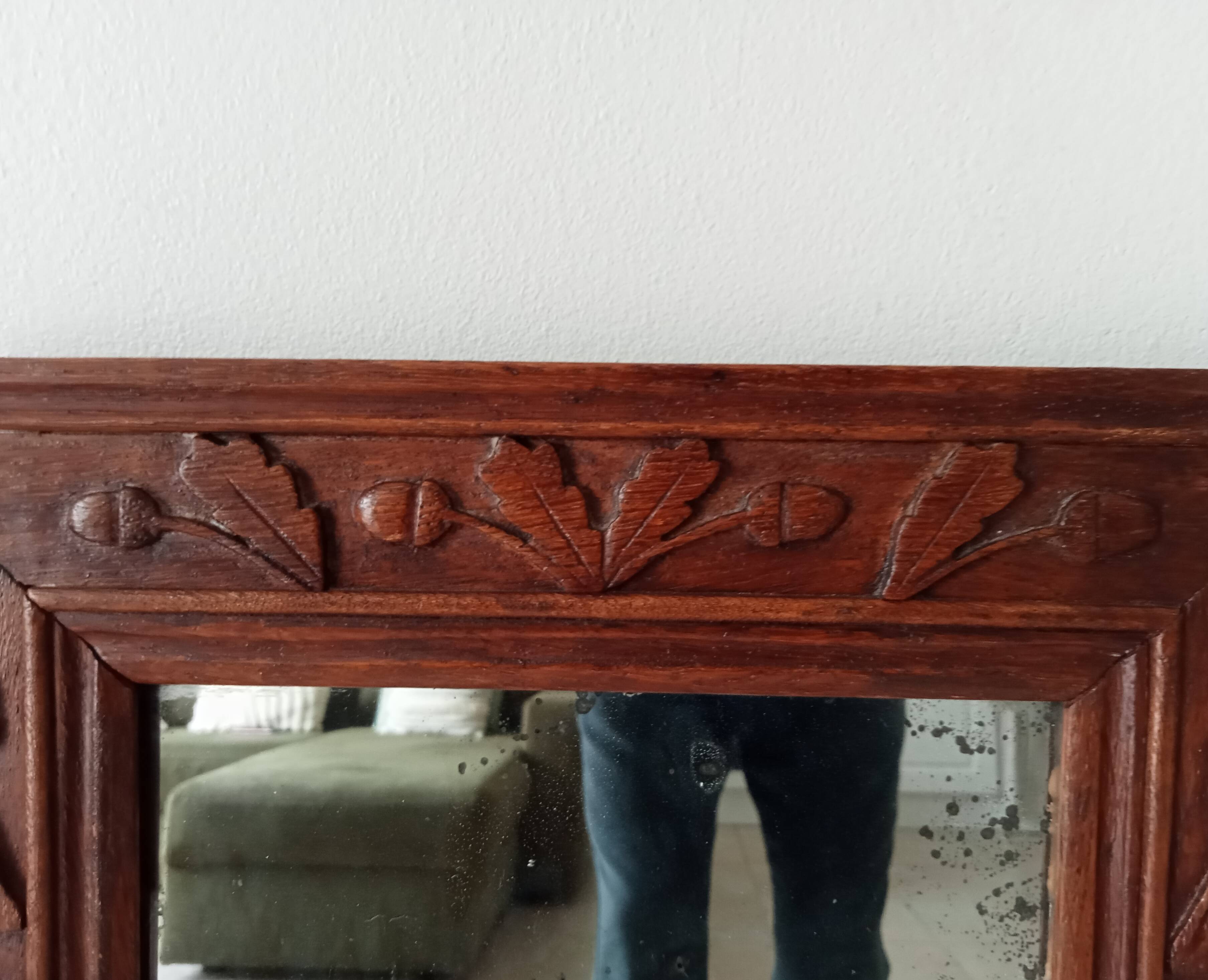 Antique mirror in carved wood