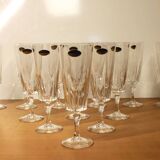 Ensemble de 12 flûtes à champagne, modèle “Versailles”, Cristal d’arques, 70’s.