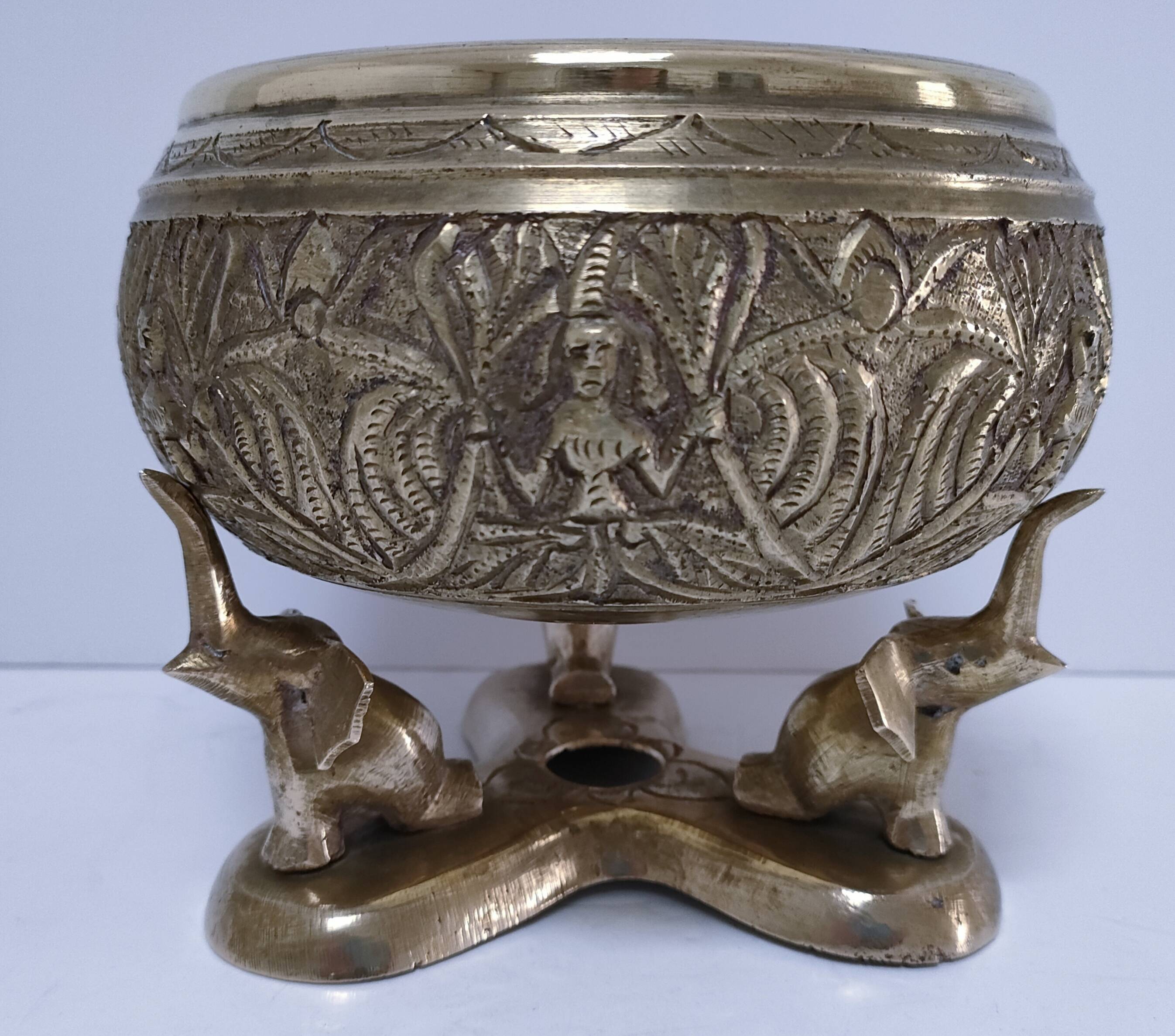 Solid brass elephant pocket emptier from the 80s