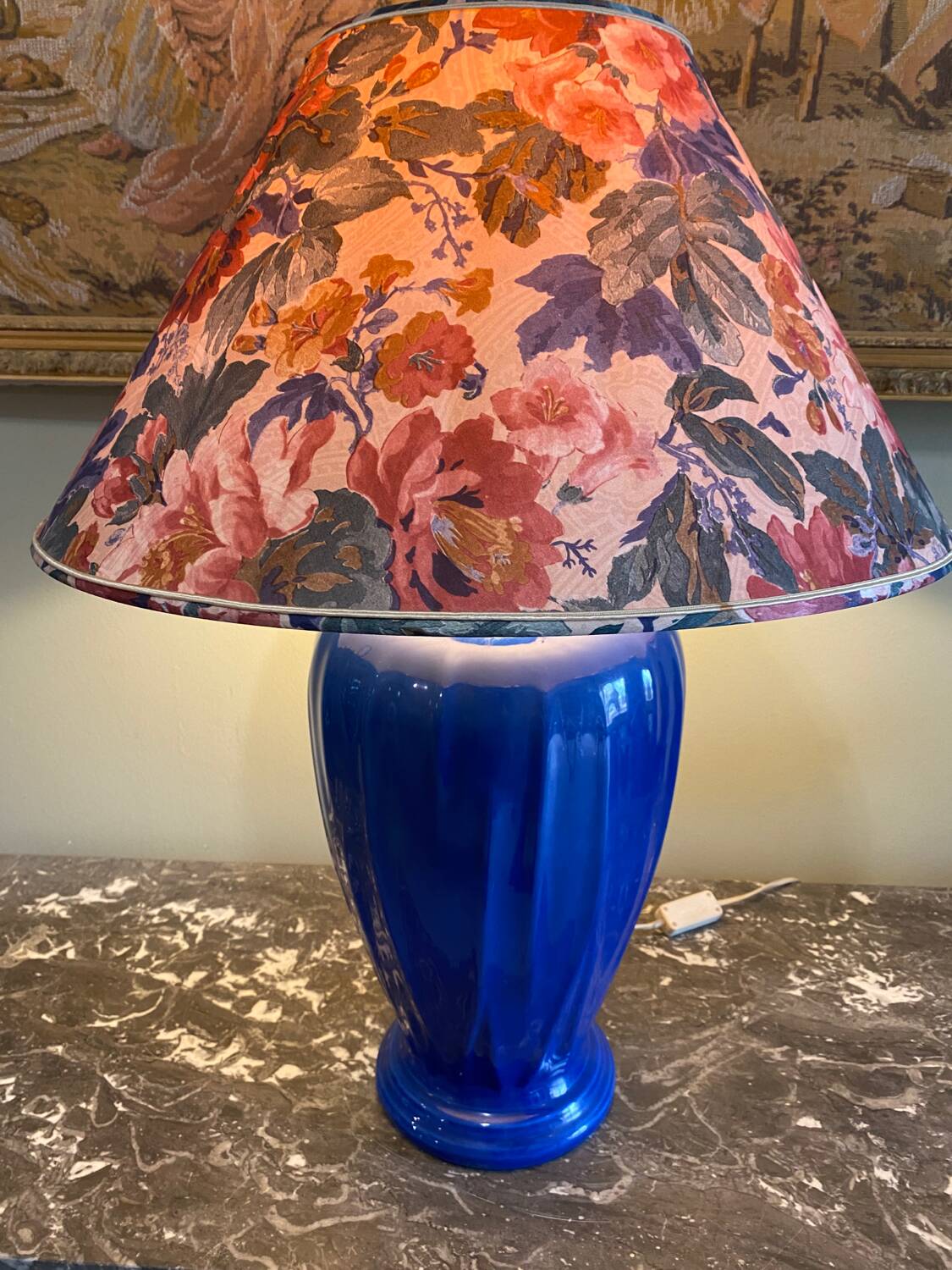 Large blue ceramic lamp with floral shade