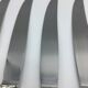 12 silver metal knives.