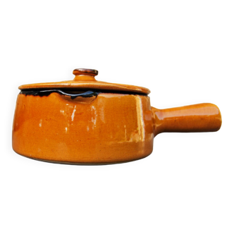 Yellow ceramic fondue pot
