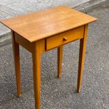 Scandinavian side table in solid wood with a drawer.