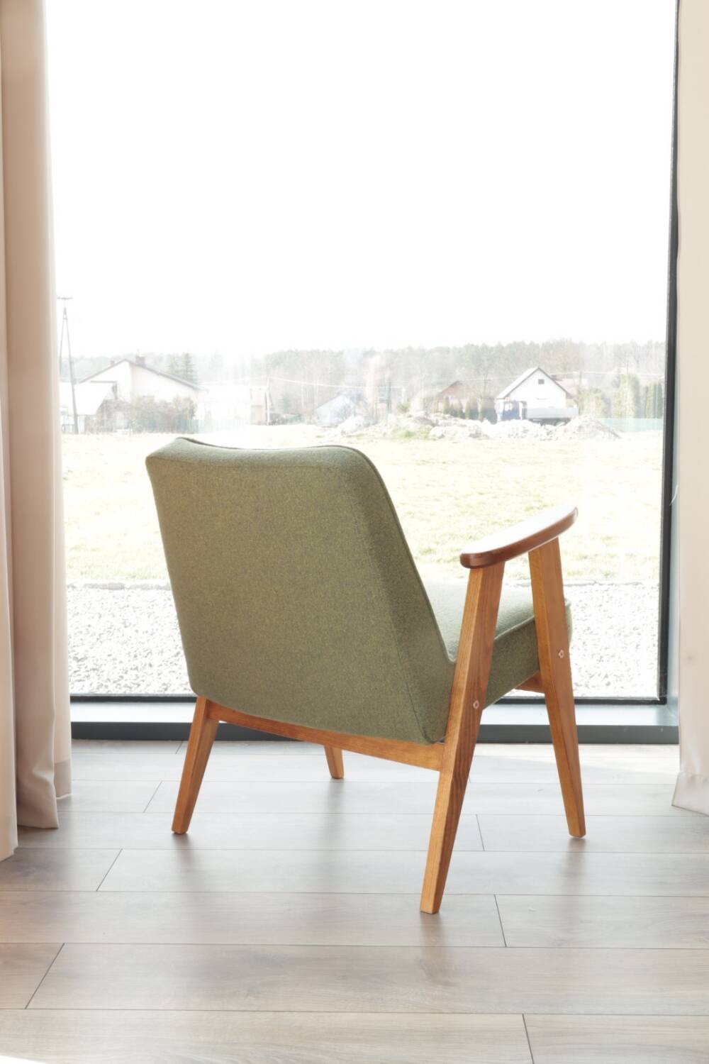 Vintage olive green bouclé armchair model 366