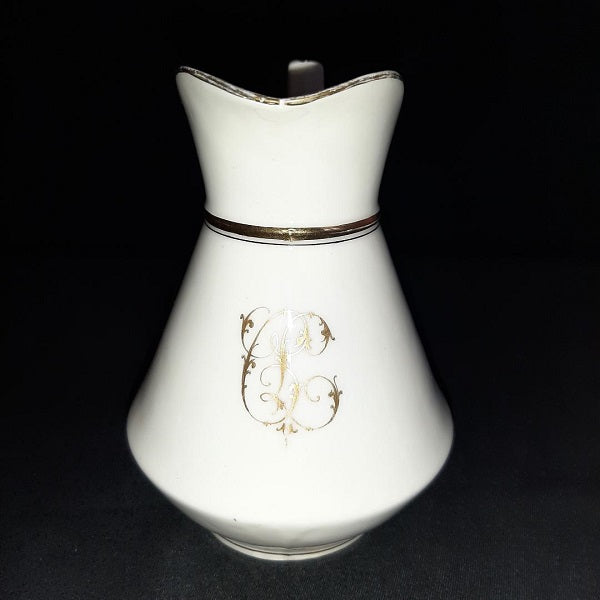 Porcelain sweetener and milk jug with cipher