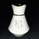 Porcelain sweetener and milk jug with cipher