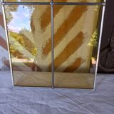 Pair of amber stained glass windows