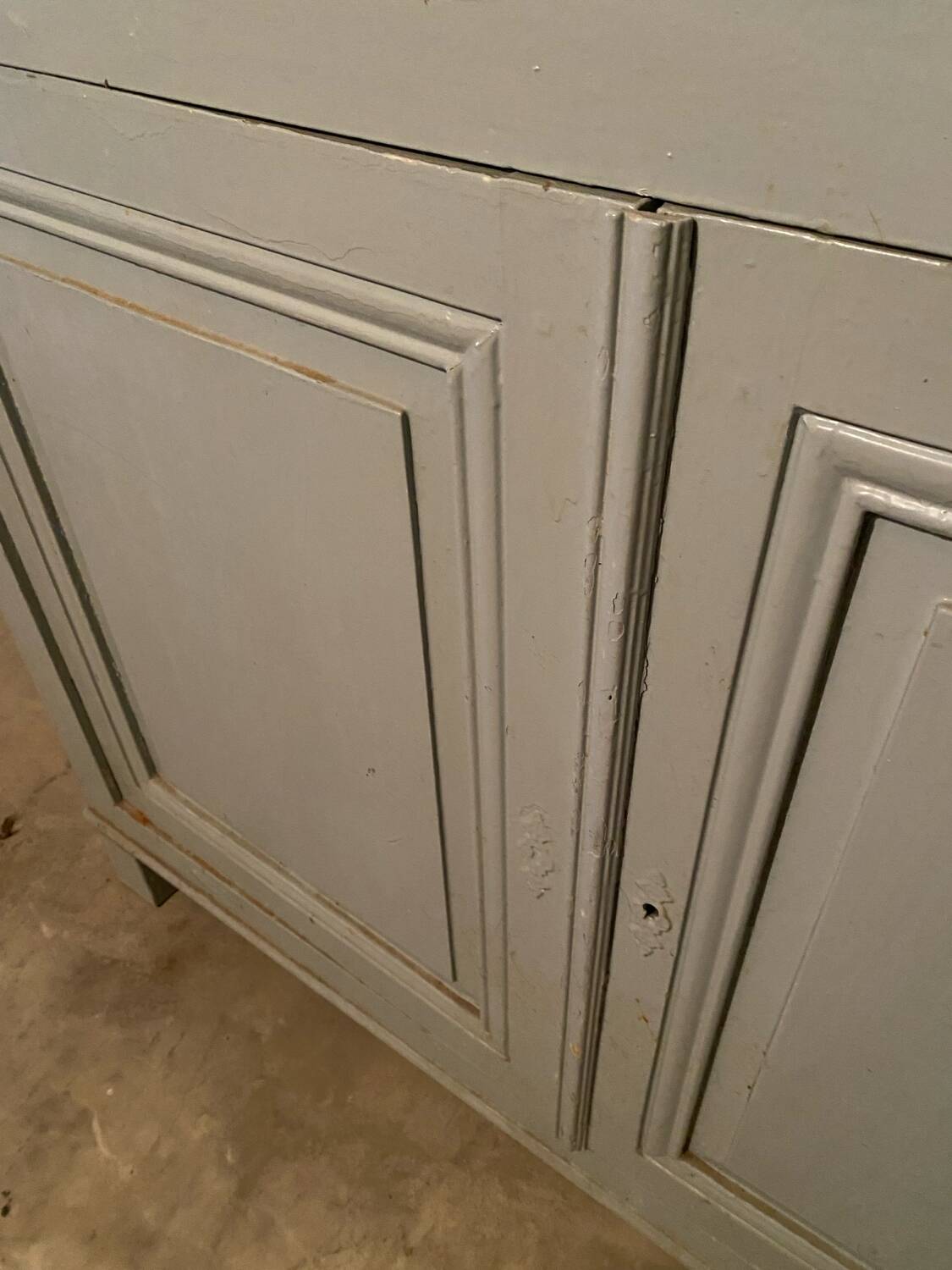 Antique vintage two-door sideboard in cloud gray