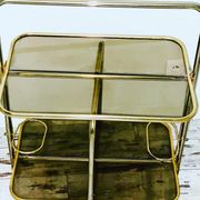 Golden tubing bar and smoked glass top circa 60/70