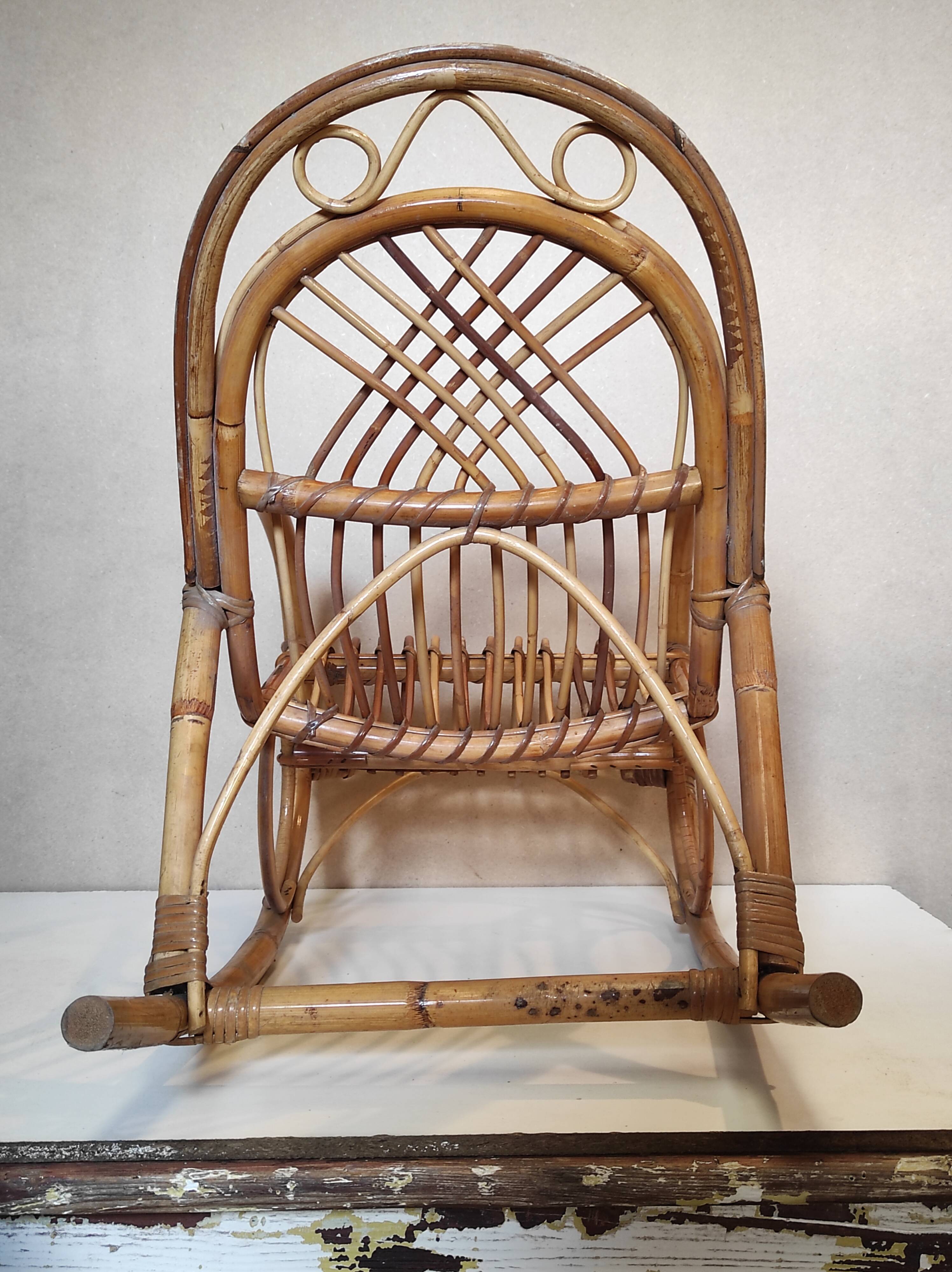 Old Italian vintage rattan rocking chair for children