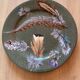 Porcelain plate with feather decoration