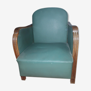 Green armchair in skai